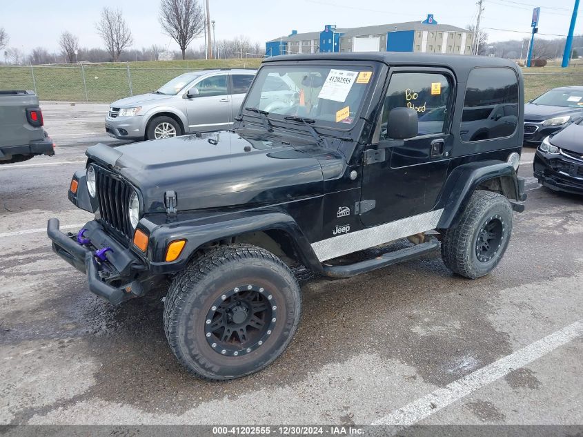 2004 Jeep Wrangler / Tj Sahara VIN: 1J4FA59SX4P742275 Lot: 41202555