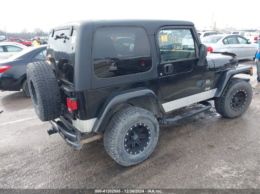 2004 Jeep Wrangler / Tj Sahara VIN: 1J4FA59SX4P742275 Lot: 41202555