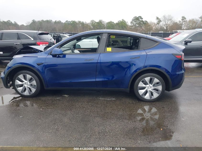 2023 Tesla Model Y Awd/Long Range Dual Motor All-Wheel Drive VIN: 7SAYGDEE2PA096705 Lot: 41203085