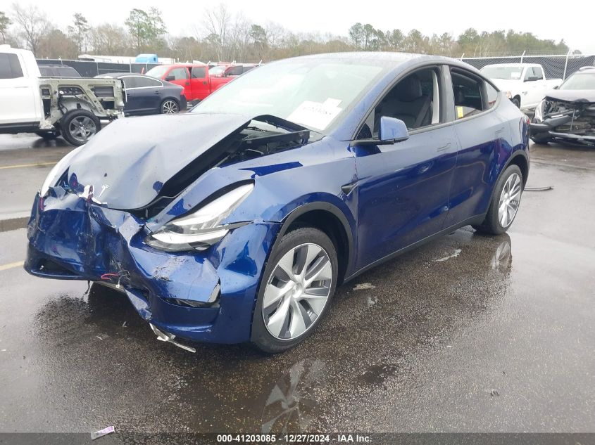 2023 Tesla Model Y Awd/Long Range Dual Motor All-Wheel Drive VIN: 7SAYGDEE2PA096705 Lot: 41203085