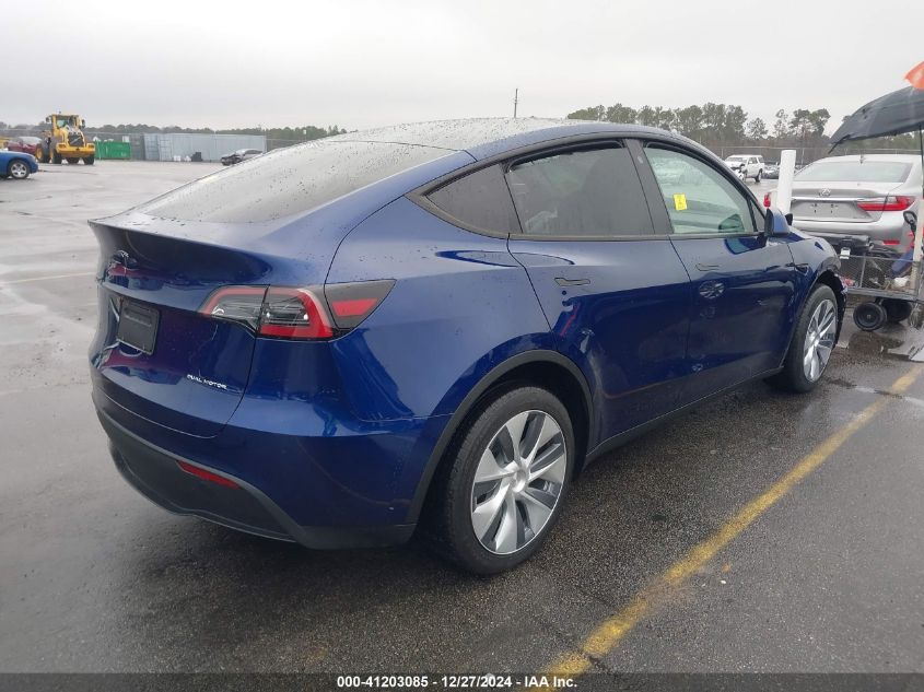 2023 Tesla Model Y Awd/Long Range Dual Motor All-Wheel Drive VIN: 7SAYGDEE2PA096705 Lot: 41203085