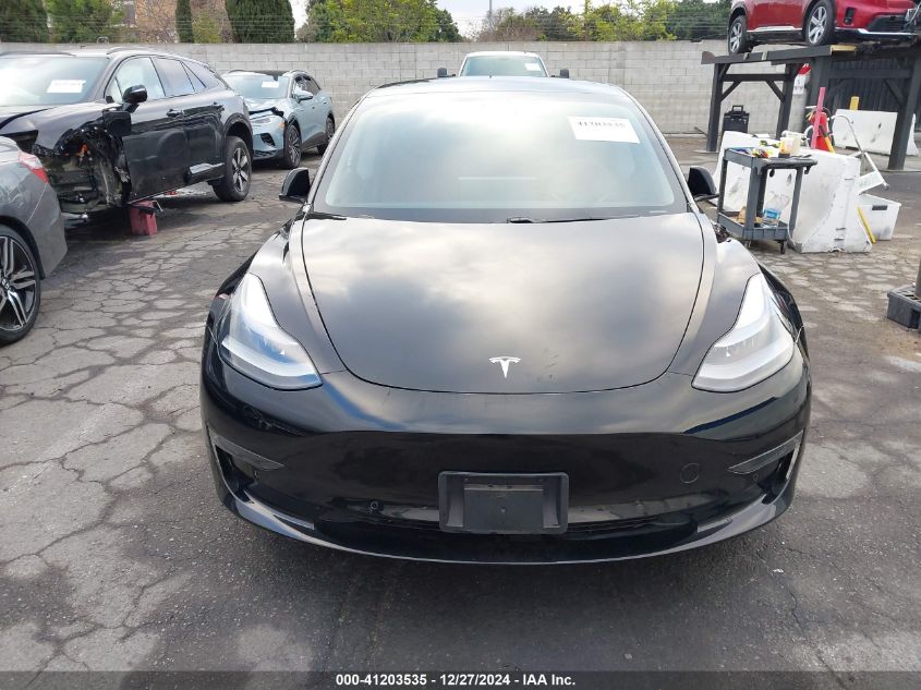 2021 Tesla Model 3 Standard Range Plus Rear-Wheel Drive VIN: 5YJ3E1EA0MF997305 Lot: 41203535