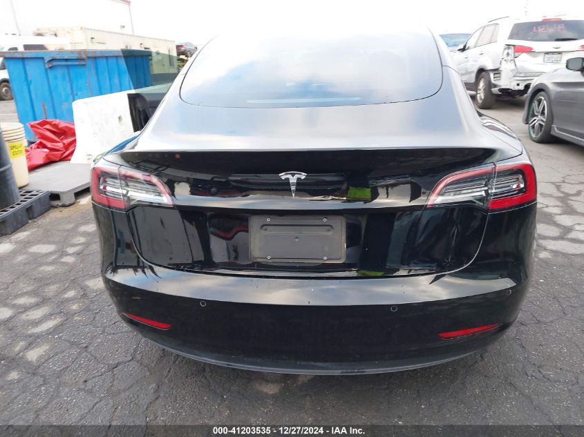 2021 Tesla Model 3 Standard Range Plus Rear-Wheel Drive VIN: 5YJ3E1EA0MF997305 Lot: 41203535