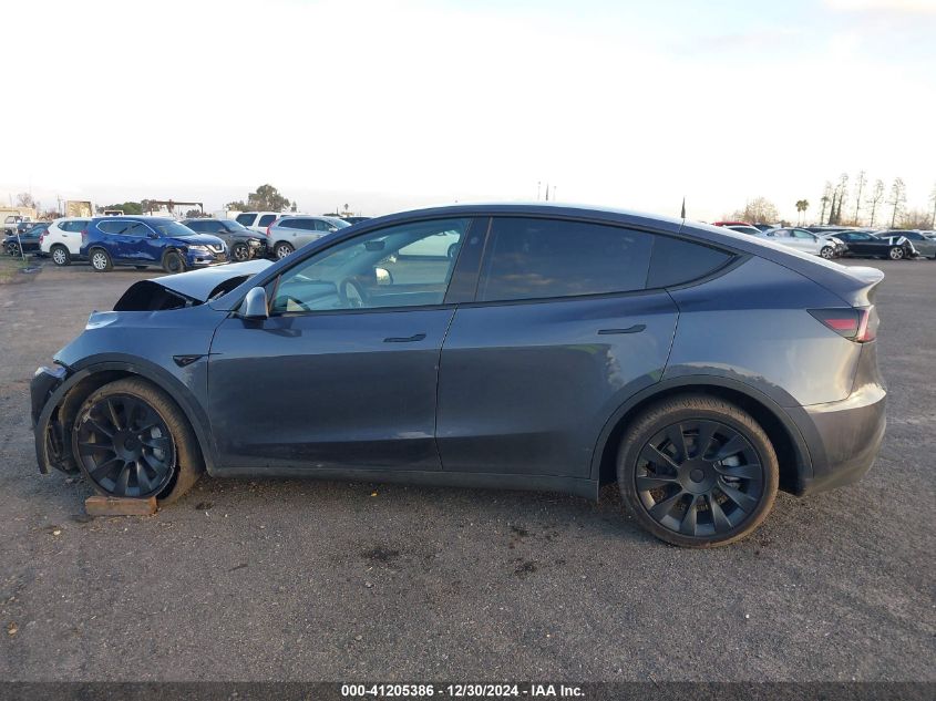 2023 Tesla Model Y Awd/Long Range Dual Motor All-Wheel Drive VIN: 7SAYGDEE9PF858527 Lot: 41205386