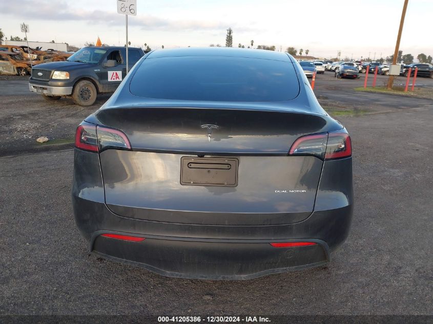 2023 Tesla Model Y Awd/Long Range Dual Motor All-Wheel Drive VIN: 7SAYGDEE9PF858527 Lot: 41205386