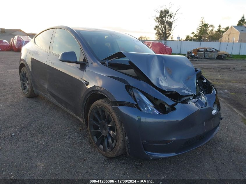 2023 Tesla Model Y Awd/Long Range Dual Motor All-Wheel Drive VIN: 7SAYGDEE9PF858527 Lot: 41205386