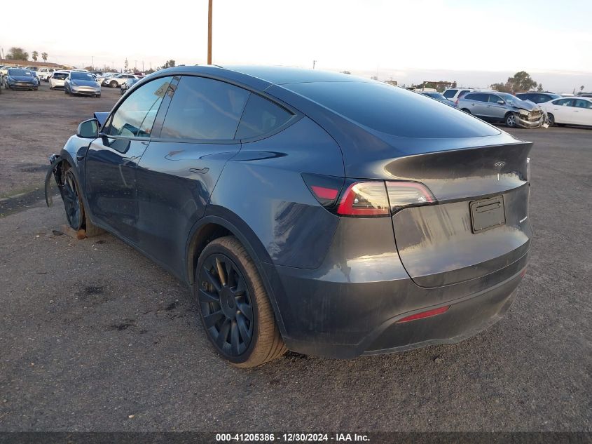 2023 Tesla Model Y Awd/Long Range Dual Motor All-Wheel Drive VIN: 7SAYGDEE9PF858527 Lot: 41205386