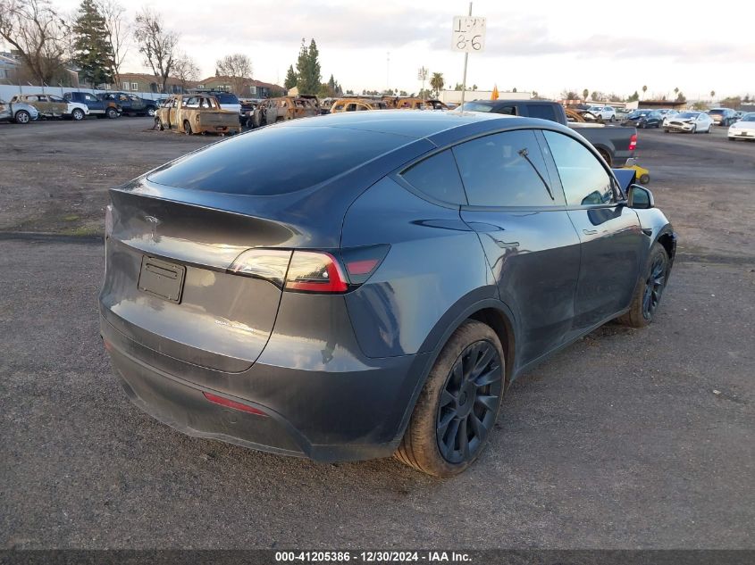 2023 Tesla Model Y Awd/Long Range Dual Motor All-Wheel Drive VIN: 7SAYGDEE9PF858527 Lot: 41205386