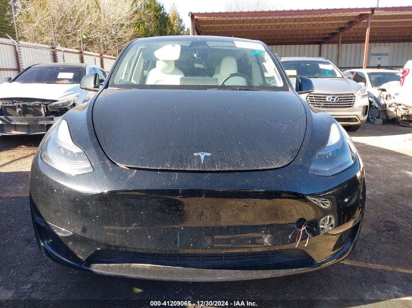 2023 Tesla Model Y Awd/Long Range Dual Motor All-Wheel Drive VIN: 7SAYGDEE3PF773151 Lot: 41209065