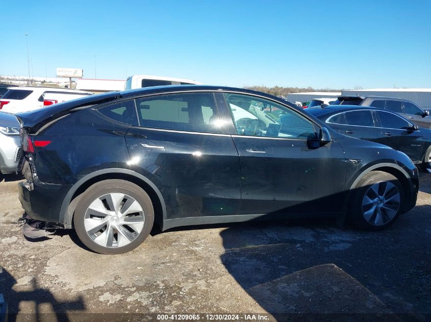 2023 Tesla Model Y Awd/Long Range Dual Motor All-Wheel Drive VIN: 7SAYGDEE3PF773151 Lot: 41209065