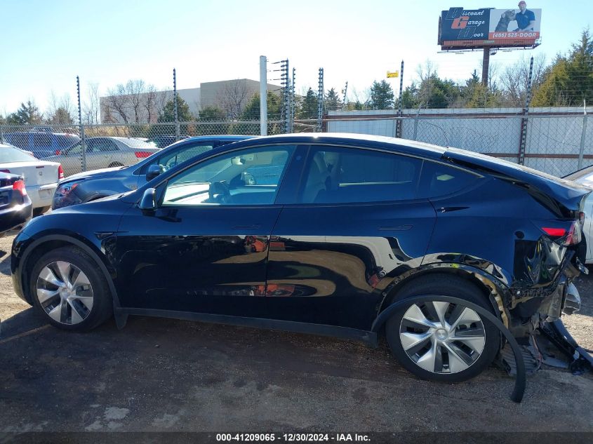 2023 Tesla Model Y Awd/Long Range Dual Motor All-Wheel Drive VIN: 7SAYGDEE3PF773151 Lot: 41209065