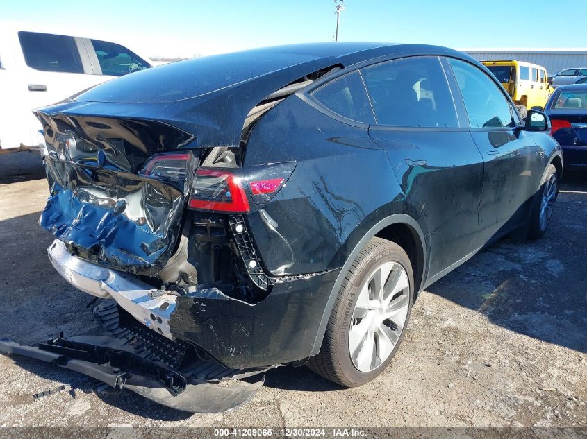 2023 Tesla Model Y Awd/Long Range Dual Motor All-Wheel Drive VIN: 7SAYGDEE3PF773151 Lot: 41209065