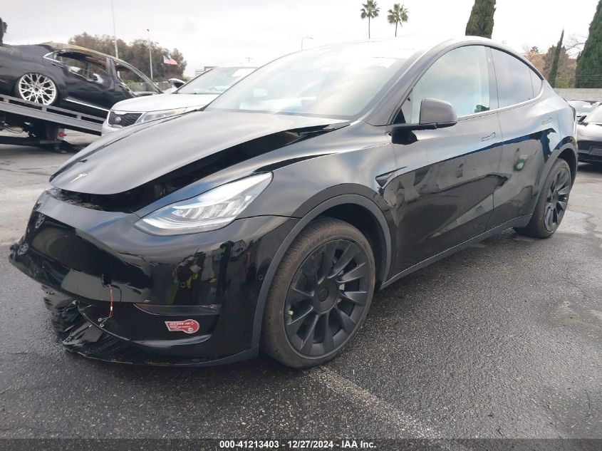 2023 Tesla Model Y Awd/Long Range Dual Motor All-Wheel Drive VIN: 7SAYGDEE2PA024032 Lot: 41213403