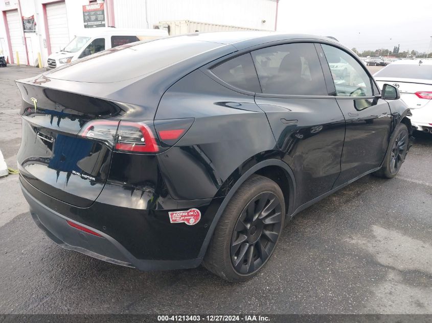 2023 Tesla Model Y Awd/Long Range Dual Motor All-Wheel Drive VIN: 7SAYGDEE2PA024032 Lot: 41213403