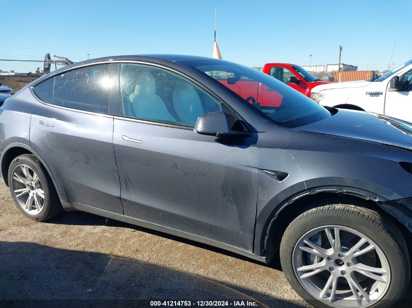 2023 Tesla Model Y Awd/Long Range Dual Motor All-Wheel Drive VIN: 7SAYGDEE2PA195802 Lot: 41214753