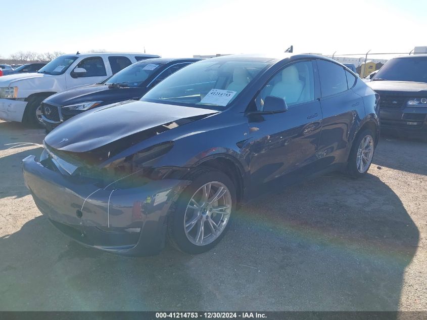 2023 Tesla Model Y Awd/Long Range Dual Motor All-Wheel Drive VIN: 7SAYGDEE2PA195802 Lot: 41214753