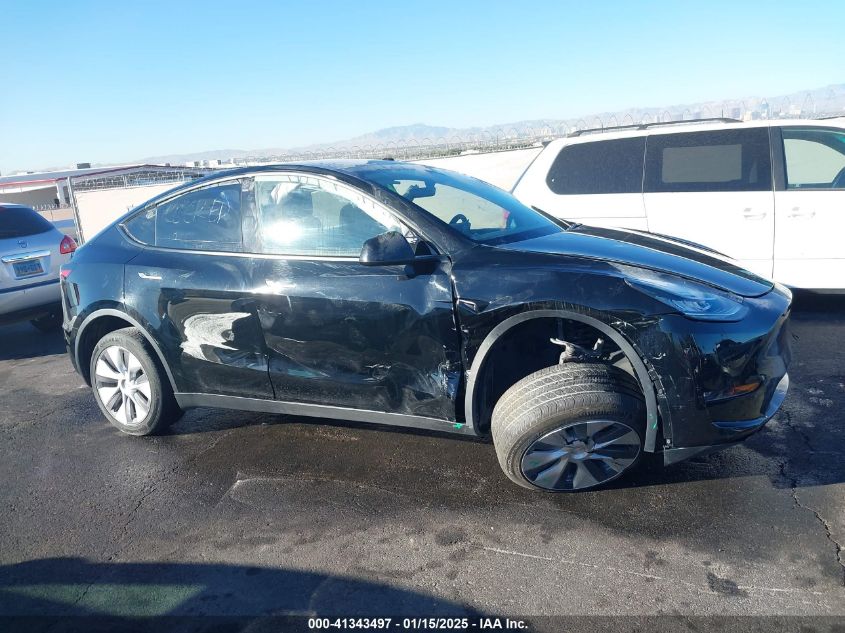 2023 Tesla Model Y Awd/Long Range Dual Motor All-Wheel Drive VIN: 7SAYGDEE8PA151965 Lot: 41343497