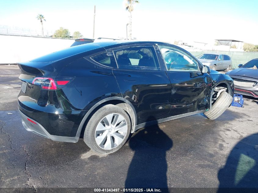 2023 Tesla Model Y Awd/Long Range Dual Motor All-Wheel Drive VIN: 7SAYGDEE8PA151965 Lot: 41343497