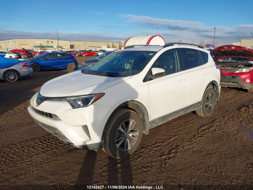 2018 Toyota Rav4 Le VIN: 2T3BFREV3JW819968 Lot: 12142427