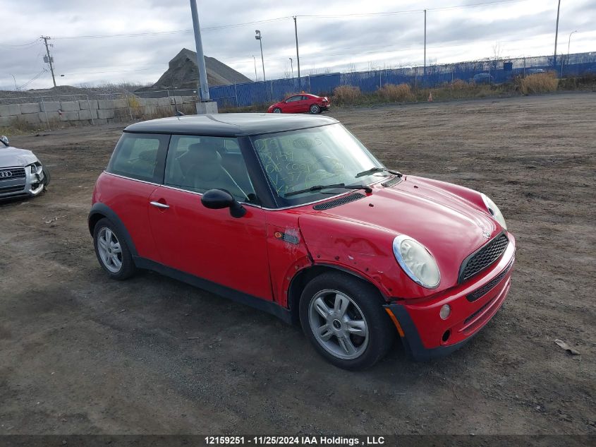 2006 Mini Cooper VIN: WMWRC33556TJ77039 Lot: 12159251