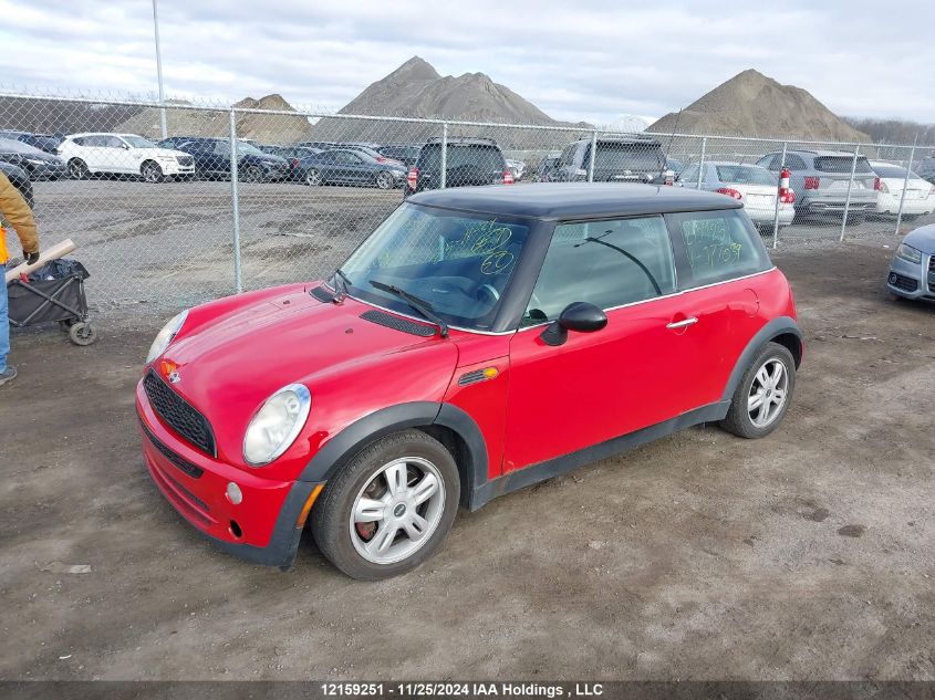 2006 Mini Cooper VIN: WMWRC33556TJ77039 Lot: 12159251