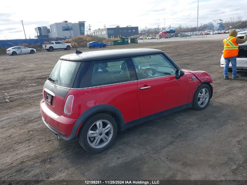 2006 Mini Cooper VIN: WMWRC33556TJ77039 Lot: 12159251