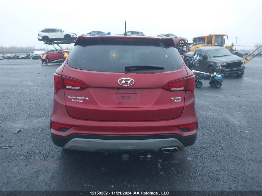 2018 Hyundai Santa Fe Sport 2.4 Base VIN: 5XYZTDLBXJG553267 Lot: 12159252