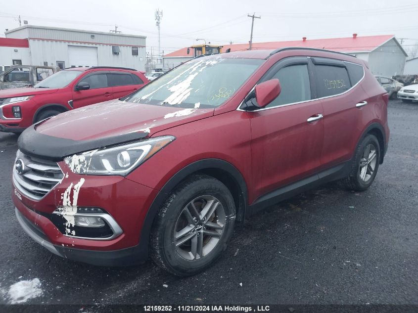 2018 Hyundai Santa Fe Sport 2.4 Base VIN: 5XYZTDLBXJG553267 Lot: 12159252