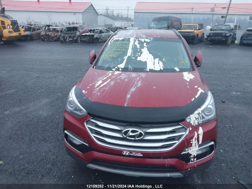 2018 Hyundai Santa Fe Sport 2.4 Base VIN: 5XYZTDLBXJG553267 Lot: 12159252