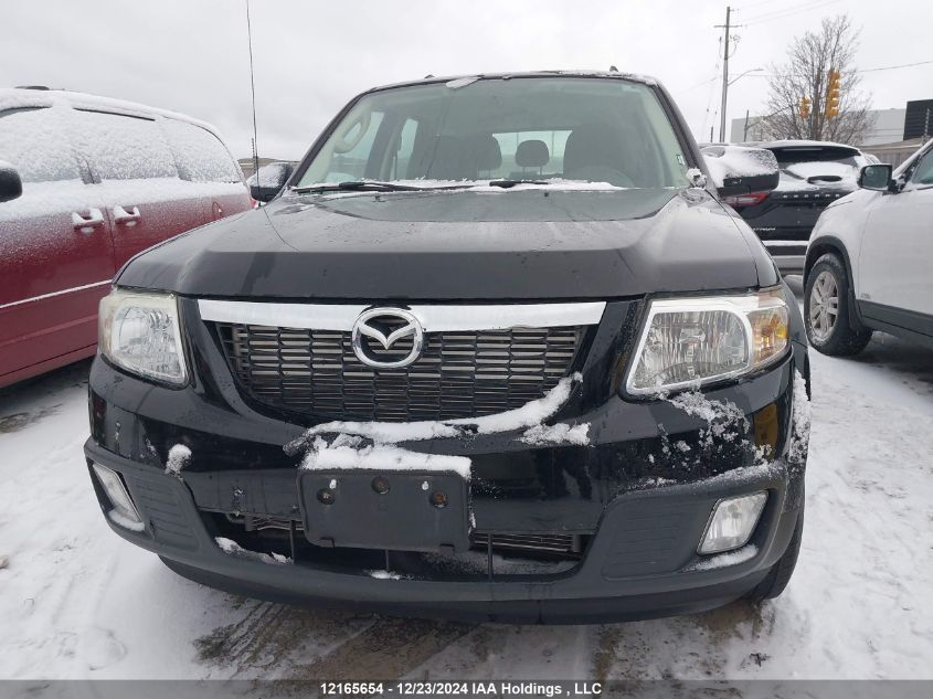 2010 Mazda Tribute I VIN: 4F2CY0C76AKM08068 Lot: 12165654