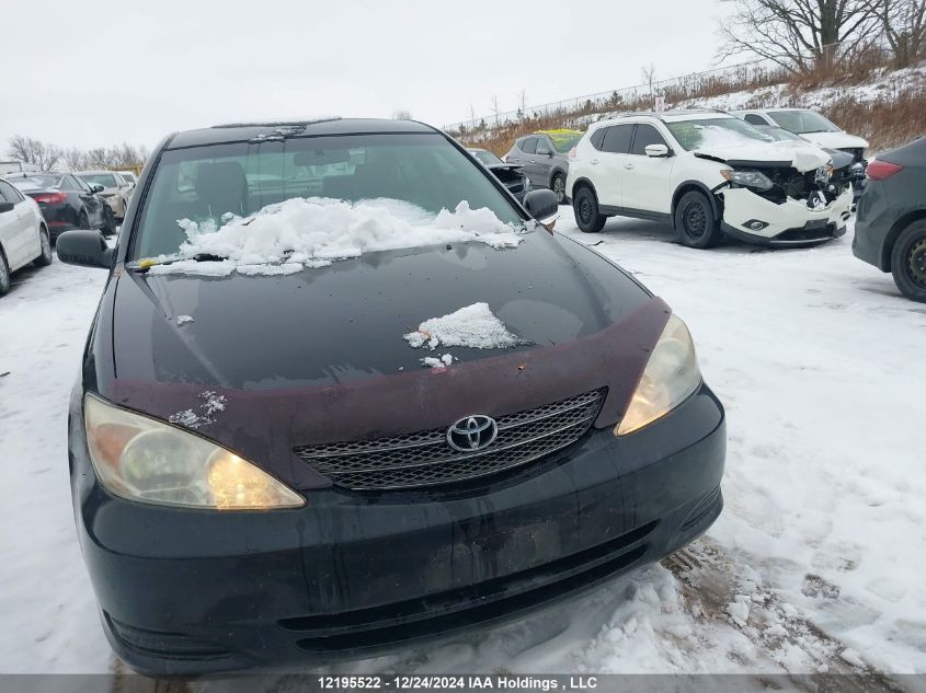 2004 Toyota Camry Le/Xle/Se VIN: 4T1BF32K94U077869 Lot: 12195522