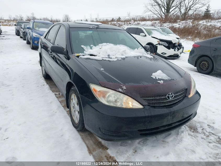 2004 Toyota Camry Le/Xle/Se VIN: 4T1BF32K94U077869 Lot: 12195522