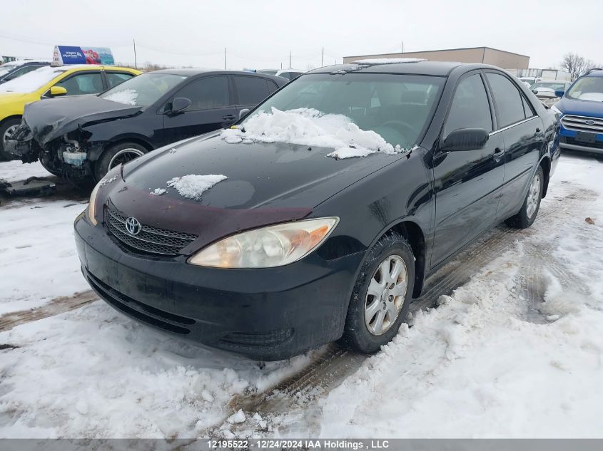 2004 Toyota Camry Le/Xle/Se VIN: 4T1BF32K94U077869 Lot: 12195522