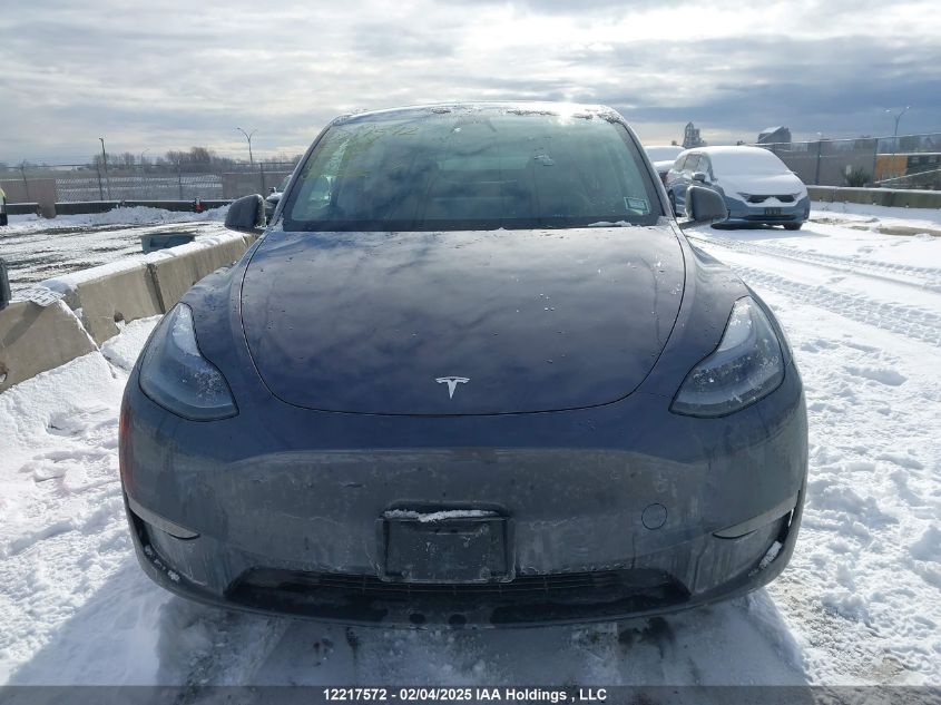 2023 Tesla Model Y VIN: LRWYGDEE2PC107468 Lot: 12217572