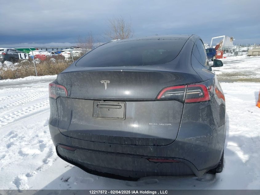 2023 Tesla Model Y VIN: LRWYGDEE2PC107468 Lot: 12217572