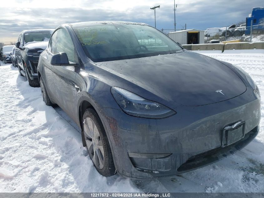 2023 Tesla Model Y VIN: LRWYGDEE2PC107468 Lot: 12217572