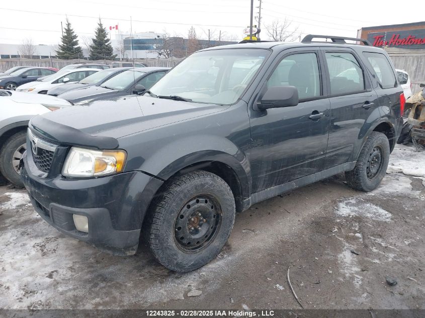 2010 Mazda Tribute Gx I4 VIN: 4F2CY9C7XAKM04898 Lot: 12243825