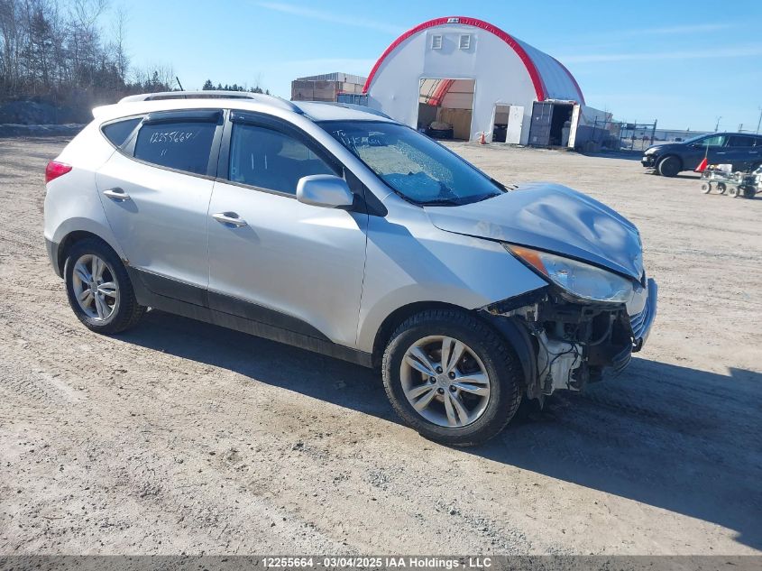 2011 Hyundai Tucson Gls/Limited VIN: KM8JUCAC1BU166005 Lot: 12255664